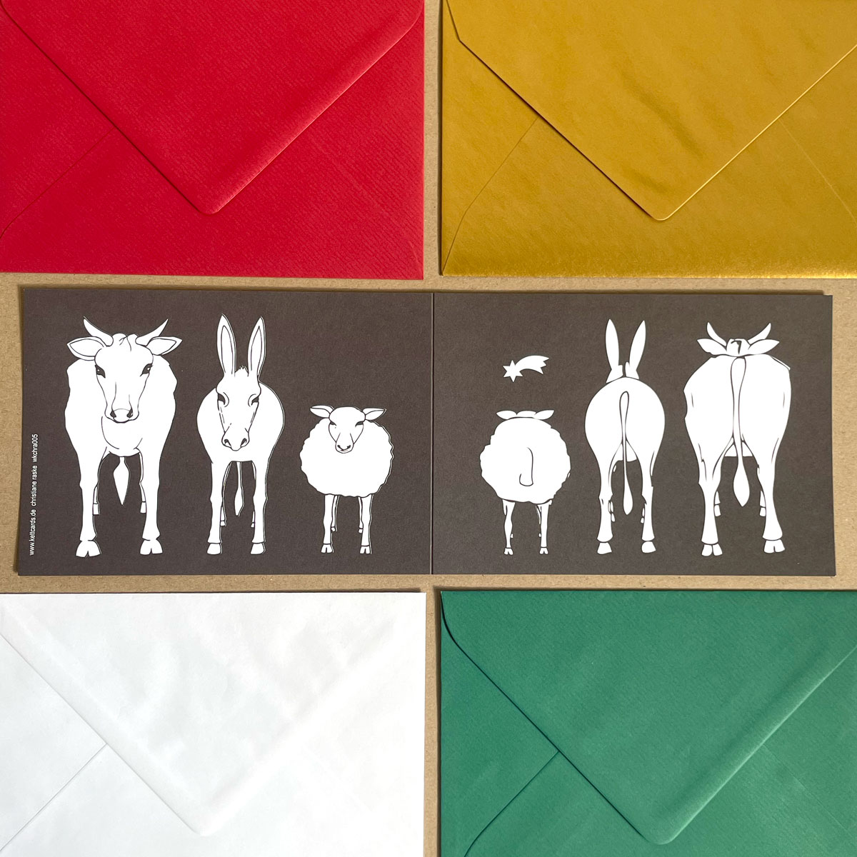 Ox, donkey and sheep looking at the star of Bethlehem, funny Corporate Christmas Cards